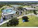 Aerial view of community pool, water park, and ample parking at 4081 Roderigo Ave, North Port, FL 34286