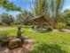 Tranquil garden with gazebo and sculpture at 4081 Roderigo Ave, North Port, FL 34286