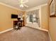 Bright home office features built-in window seat, carpet, and ample natural light at 4081 Roderigo Ave, North Port, FL 34286