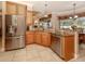 Modern kitchen featuring stainless steel appliances and granite counters at 4081 Roderigo Ave, North Port, FL 34286