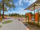 Large playground with various play structures at 4081 Roderigo Ave, North Port, FL 34286