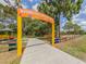Entrance to a playground with fun play features at 4081 Roderigo Ave, North Port, FL 34286