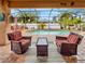 Spacious covered patio with comfortable seating overlooking the pool at 4081 Roderigo Ave, North Port, FL 34286