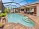 Relaxing screened pool area with ample patio space for entertaining at 4081 Roderigo Ave, North Port, FL 34286