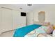 Bright bedroom with double bed and plenty of closet space at 411 Circlewood Dr # I2, Venice, FL 34293