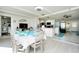 Open concept dining area with seating for six and kitchen views at 411 Circlewood Dr # I2, Venice, FL 34293
