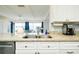 Kitchen with granite countertops and stainless steel appliances at 411 Circlewood Dr # I2, Venice, FL 34293