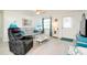 Spacious living room with comfortable seating and light decor at 411 Circlewood Dr # I2, Venice, FL 34293