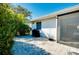 Outdoor patio with brick pavers, adjacent to the house and featuring a grill at 411 Circlewood Dr # I2, Venice, FL 34293