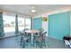 Sunroom with table and chairs, offering extra living space with a view at 411 Circlewood Dr # I2, Venice, FL 34293