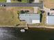 Bird's-eye view of a waterfront home and its surroundings at 4190 Pelican Pointe Dr, Punta Gorda, FL 33950