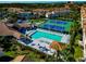 Community overview showcasing pool, tennis, and clubhouse at 4200 Castlebridge Ln # 1924, Sarasota, FL 34238
