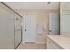 Bathroom with shower, vanity, and linen closet at 4200 Castlebridge Ln # 1924, Sarasota, FL 34238