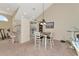 Kitchen and dining area with breakfast bar and high-top table at 4200 Castlebridge Ln # 1924, Sarasota, FL 34238