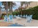 Community fire pit with seating for gatherings at 4200 Castlebridge Ln # 1924, Sarasota, FL 34238