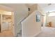 Upper-level laundry room with washer, dryer, and shelving at 4200 Castlebridge Ln # 1924, Sarasota, FL 34238