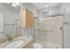 Clean bathroom with granite countertop and shower at 4575 Cancello Grande Ave, Venice, FL 34293