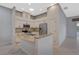 Modern kitchen with stainless steel appliances and granite countertops at 4575 Cancello Grande Ave, Venice, FL 34293