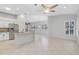 Modern kitchen with stainless steel appliances and granite island at 4575 Cancello Grande Ave, Venice, FL 34293