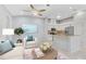 Open concept kitchen and living area with granite countertops at 4575 Cancello Grande Ave, Venice, FL 34293