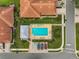 Community pool with lounge chairs and a covered patio at 4575 Cancello Grande Ave, Venice, FL 34293