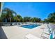 Inviting community pool with surrounding patio and lounge chairs at 4575 Cancello Grande Ave, Venice, FL 34293