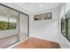 Sunroom with sliding glass doors and multiple windows at 4575 Cancello Grande Ave, Venice, FL 34293