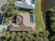 Single-Gathering home with pool and canal view at 498 Lake Of The Woods Dr, Venice, FL 34293