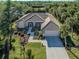 Single-Gathering home with pool and canal-front view at 498 Lake Of The Woods Dr, Venice, FL 34293