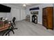 Home office features wood-look floors and built-in storage at 498 Lake Of The Woods Dr, Venice, FL 34293