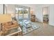Open living room and bedroom view at 519 Albee Farm Rd # 115, Venice, FL 34285