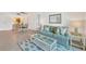 Living room with dining area and sofa at 519 Albee Farm Rd # 115, Venice, FL 34285