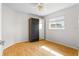 Bedroom with mirrored closet and ceiling fan at 521 Pennyroyal Pl, Venice, FL 34293