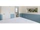 Bedroom with double bed and en-suite bathroom at 521 Pennyroyal Pl, Venice, FL 34293