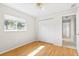 Bedroom with double closet and ceiling fan at 521 Pennyroyal Pl, Venice, FL 34293