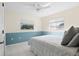 Bright bedroom with double bed and ceiling fan at 521 Pennyroyal Pl, Venice, FL 34293