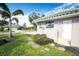 Exterior view of home with walkway and landscaping at 521 Pennyroyal Pl, Venice, FL 34293