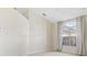 Bright room with large window and high ceilings at 521 Pennyroyal Pl, Venice, FL 34293