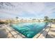 Community pool with surrounding fence at 521 Pennyroyal Pl, Venice, FL 34293