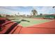 Community tennis courts with seating at 521 Pennyroyal Pl, Venice, FL 34293