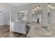 Bathroom with a vanity, sink, and mirror at 552 Fleetwood St, North Port, FL 34287