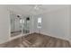 Spacious bedroom with ceiling fan and sliding glass doors at 552 Fleetwood St, North Port, FL 34287