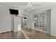 Bright bedroom with mirrored closet and sliding glass doors at 552 Fleetwood St, North Port, FL 34287