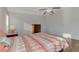 Bedroom with a queen-size bed, dresser and wood floors at 552 Fleetwood St, North Port, FL 34287