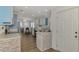 Kitchen with stainless steel appliances and blue cabinets at 552 Fleetwood St, North Port, FL 34287