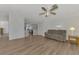 Open concept living room with view into kitchen at 552 Fleetwood St, North Port, FL 34287