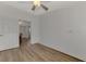 Bright and airy office space with wood flooring and access to other rooms at 552 Fleetwood St, North Port, FL 34287