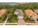 Luxury home community with lush landscaping and a lake view at 5592 Semolino St, Nokomis, FL 34275