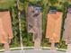 Aerial view of homes with tile roofs in Bellacina community at 5592 Semolino St, Nokomis, FL 34275