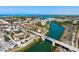 Aerial view of waterfront homes and bridge at 5592 Semolino St, Nokomis, FL 34275